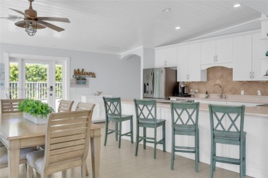 This Key Colony Beach coastal retreat blends modern elegance on Key Colony Beach Golf Course in Florida - for sale on GolfHomes.com, golf home, golf lot