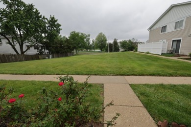 This is a 2 story end unit town home located in a quiet on Poplar Creek Country Club in Illinois - for sale on GolfHomes.com, golf home, golf lot