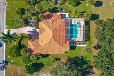 Beautiful three bedroom three bathroom custom home positioned on on Meadowood Golf and Tennis Club in Florida - for sale on GolfHomes.com, golf home, golf lot