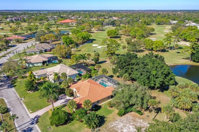 Beautiful three bedroom three bathroom custom home positioned on on Meadowood Golf and Tennis Club in Florida - for sale on GolfHomes.com, golf home, golf lot