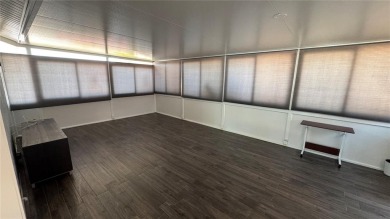 Charming and updated 2-bedroom, 1-bath, 1-car garage home on an on Duffys Golf Center in Florida - for sale on GolfHomes.com, golf home, golf lot