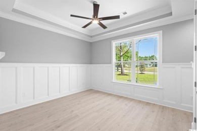 This brand-new custom home boasts 5 spacious bedrooms and 4 on Wild Wing Plantation in South Carolina - for sale on GolfHomes.com, golf home, golf lot