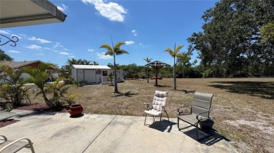 Charming and updated 2-bedroom, 1-bath, 1-car garage home on an on Duffys Golf Center in Florida - for sale on GolfHomes.com, golf home, golf lot