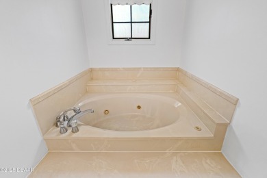 Live where every day feels like a beach day! This 3-bed, 2 on Oceans Golf Club in Florida - for sale on GolfHomes.com, golf home, golf lot