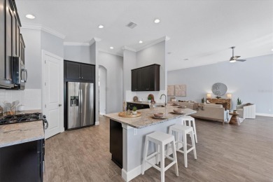 Experience the best of Florida living in this 3 bedroom, 2.5 on Esplanade Golf and Country at Lakewood Ranch in Florida - for sale on GolfHomes.com, golf home, golf lot