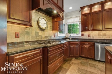 Nestled on a quiet cul-de-sac in the prestigious St. Clair Golf on St Clair River Country Club in Michigan - for sale on GolfHomes.com, golf home, golf lot