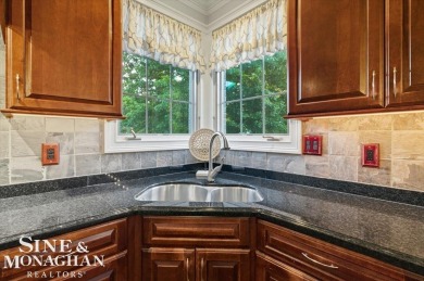 Nestled on a quiet cul-de-sac in the prestigious St. Clair Golf on St Clair River Country Club in Michigan - for sale on GolfHomes.com, golf home, golf lot