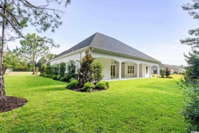 This brand-new custom home boasts 5 spacious bedrooms and 4 on Wild Wing Plantation in South Carolina - for sale on GolfHomes.com, golf home, golf lot