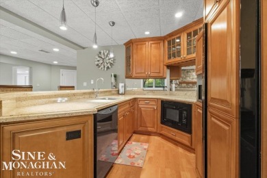 Nestled on a quiet cul-de-sac in the prestigious St. Clair Golf on St Clair River Country Club in Michigan - for sale on GolfHomes.com, golf home, golf lot