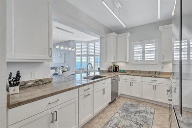 GORGEOUS fully renovated WATERFRONT corner residence in The Bay on Terra Ceia Golf and Country Club in Florida - for sale on GolfHomes.com, golf home, golf lot