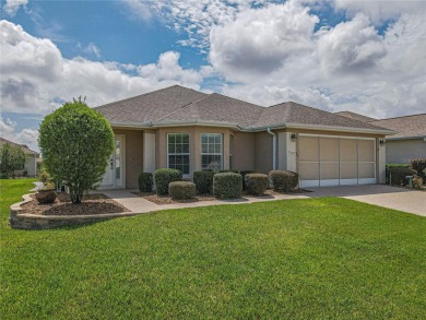 Welcome to this charming Challedon model home, nestled in the on Eagle Ridge At Spruce Creek Country Club in Florida - for sale on GolfHomes.com, golf home, golf lot