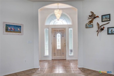 Welcome to 13th Fairway that hosts a beautifully appointed on Rockport Country Club in Texas - for sale on GolfHomes.com, golf home, golf lot