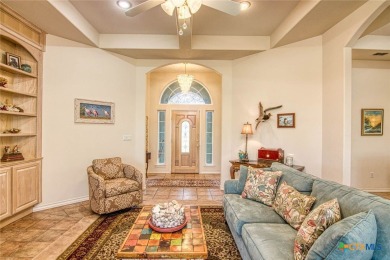 Welcome to 13th Fairway that hosts a beautifully appointed on Rockport Country Club in Texas - for sale on GolfHomes.com, golf home, golf lot