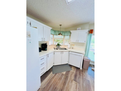 Experience the perfect coastal feel in this beautiful on Pine Lakes Country Club in Florida - for sale on GolfHomes.com, golf home, golf lot