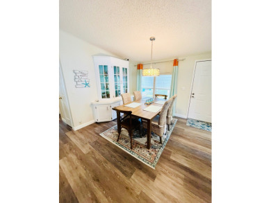 Experience the perfect coastal feel in this beautiful on Pine Lakes Country Club in Florida - for sale on GolfHomes.com, golf home, golf lot