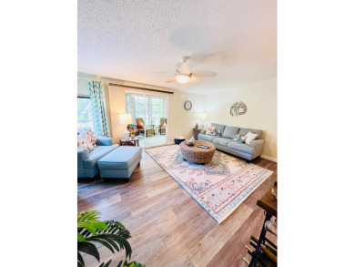 Experience the perfect coastal feel in this beautiful on Pine Lakes Country Club in Florida - for sale on GolfHomes.com, golf home, golf lot