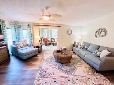 Experience the perfect coastal feel in this beautiful on Pine Lakes Country Club in Florida - for sale on GolfHomes.com, golf home, golf lot