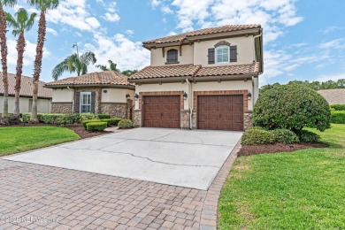 Welcome to this beautifully crafted Estaurio courtyard home by on Jacksonville Golf and Country Club in Florida - for sale on GolfHomes.com, golf home, golf lot