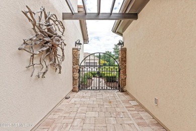 Welcome to this beautifully crafted Estaurio courtyard home by on Jacksonville Golf and Country Club in Florida - for sale on GolfHomes.com, golf home, golf lot
