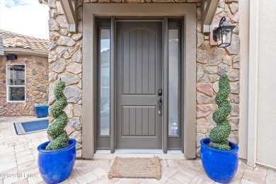 Welcome to this beautifully crafted Estaurio courtyard home by on Jacksonville Golf and Country Club in Florida - for sale on GolfHomes.com, golf home, golf lot