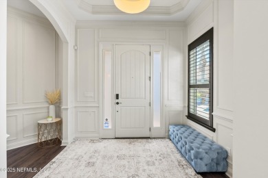 Welcome to this beautifully crafted Estaurio courtyard home by on Jacksonville Golf and Country Club in Florida - for sale on GolfHomes.com, golf home, golf lot