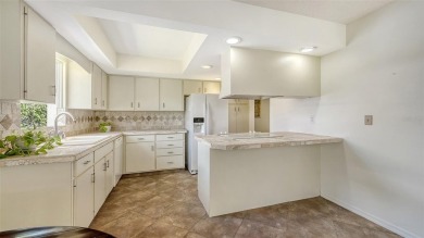 Nestled within the highly sought after, golf-oriented community on The Meadows Golf and Country Club in Florida - for sale on GolfHomes.com, golf home, golf lot