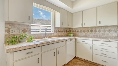 Nestled within the highly sought after, golf-oriented community on The Meadows Golf and Country Club in Florida - for sale on GolfHomes.com, golf home, golf lot