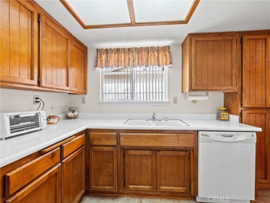 Welcome to your new home at 13915 Topmast Dr in the charming on Silver Lakes Golf Course in California - for sale on GolfHomes.com, golf home, golf lot