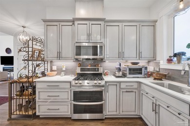 Welcome home to this exceptional waterfront sanctuary where on Tiger Point Golf and Country Club in Florida - for sale on GolfHomes.com, golf home, golf lot