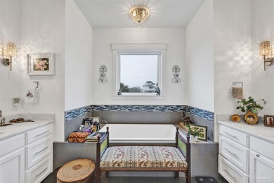 Welcome home to this exceptional waterfront sanctuary where on Tiger Point Golf and Country Club in Florida - for sale on GolfHomes.com, golf home, golf lot