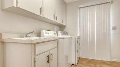 Nestled within the highly sought after, golf-oriented community on The Meadows Golf and Country Club in Florida - for sale on GolfHomes.com, golf home, golf lot