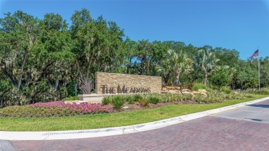 Nestled within the highly sought after, golf-oriented community on The Meadows Golf and Country Club in Florida - for sale on GolfHomes.com, golf home, golf lot