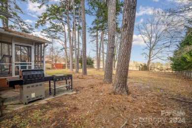 This is a lovely 4 bedroom, 2 bath home sitting on the city golf on Gastonia Municipal Golf Course in North Carolina - for sale on GolfHomes.com, golf home, golf lot