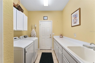 An outstanding JOHNSTOWN in the neighborhood of WELLINGTON.  3 on Eagle Ridge At Spruce Creek Country Club in Florida - for sale on GolfHomes.com, golf home, golf lot
