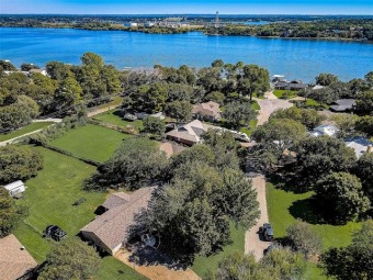 Lake life at it's best! This meticulously maintained 3 bedroom on De Cordova Bend Country Club in Texas - for sale on GolfHomes.com, golf home, golf lot