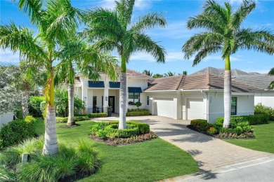 Step into unparalleled luxury in the prestigious Marsh Cove in on The Golf Club At Fiddlers Creek in Florida - for sale on GolfHomes.com, golf home, golf lot