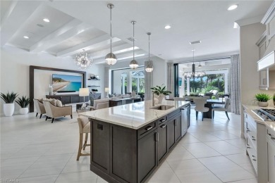 Step into unparalleled luxury in the prestigious Marsh Cove in on The Golf Club At Fiddlers Creek in Florida - for sale on GolfHomes.com, golf home, golf lot