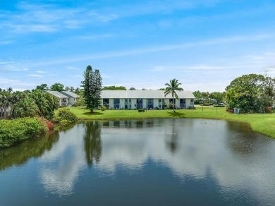 Serene Lake Views & Modern Upgrades Await! This beautifully on Pine Lakes Golf Club in Florida - for sale on GolfHomes.com, golf home, golf lot