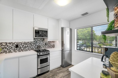 Serene Lake Views & Modern Upgrades Await! This beautifully on Pine Lakes Golf Club in Florida - for sale on GolfHomes.com, golf home, golf lot