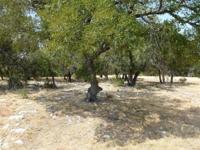 Nice corner lot on a cul-de-sac has distant lake views from the on Summit Rock Golf Course in Texas - for sale on GolfHomes.com, golf home, golf lot