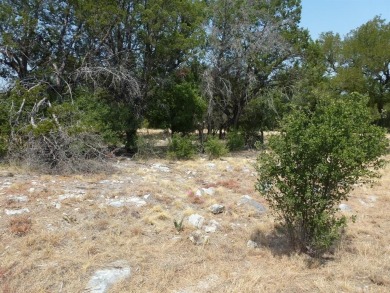 Nice corner lot on a cul-de-sac has distant lake views from the on Summit Rock Golf Course in Texas - for sale on GolfHomes.com, golf home, golf lot