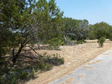 Nice corner lot on a cul-de-sac has distant lake views from the on Summit Rock Golf Course in Texas - for sale on GolfHomes.com, golf home, golf lot