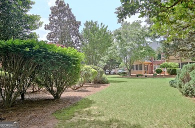 Stunning Golf Course Home on the 17th Tee!  This elegant 4-sides on Canongate On White Oak Golf Course in Georgia - for sale on GolfHomes.com, golf home, golf lot