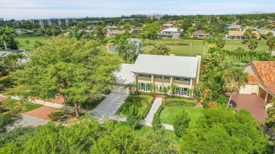 Welcome to a truly unique two-story Southern Colonial home on Deer Creek Golf Club in Florida - for sale on GolfHomes.com, golf home, golf lot