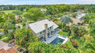 Welcome to a truly unique two-story Southern Colonial home on Deer Creek Golf Club in Florida - for sale on GolfHomes.com, golf home, golf lot