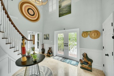 Welcome to a truly unique two-story Southern Colonial home on Deer Creek Golf Club in Florida - for sale on GolfHomes.com, golf home, golf lot