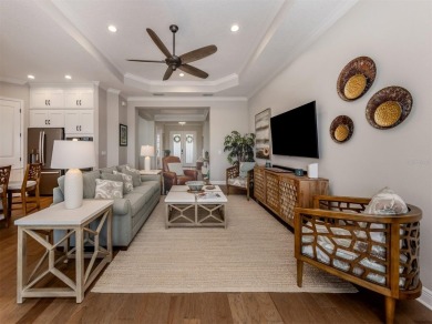 Come on into a beautiful, sophisticated coastal, Sea Star model on Boca Royale Golf and Country Club in Florida - for sale on GolfHomes.com, golf home, golf lot