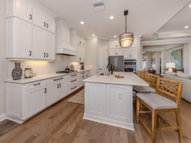Come on into a beautiful, sophisticated coastal, Sea Star model on Boca Royale Golf and Country Club in Florida - for sale on GolfHomes.com, golf home, golf lot