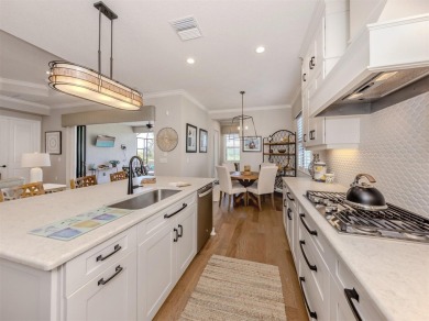 Come on into a beautiful, sophisticated coastal, Sea Star model on Boca Royale Golf and Country Club in Florida - for sale on GolfHomes.com, golf home, golf lot
