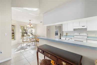 Welcome to this charming and well-maintained 2-bedroom, 2-bath on Oak Hills Country Club in Florida - for sale on GolfHomes.com, golf home, golf lot